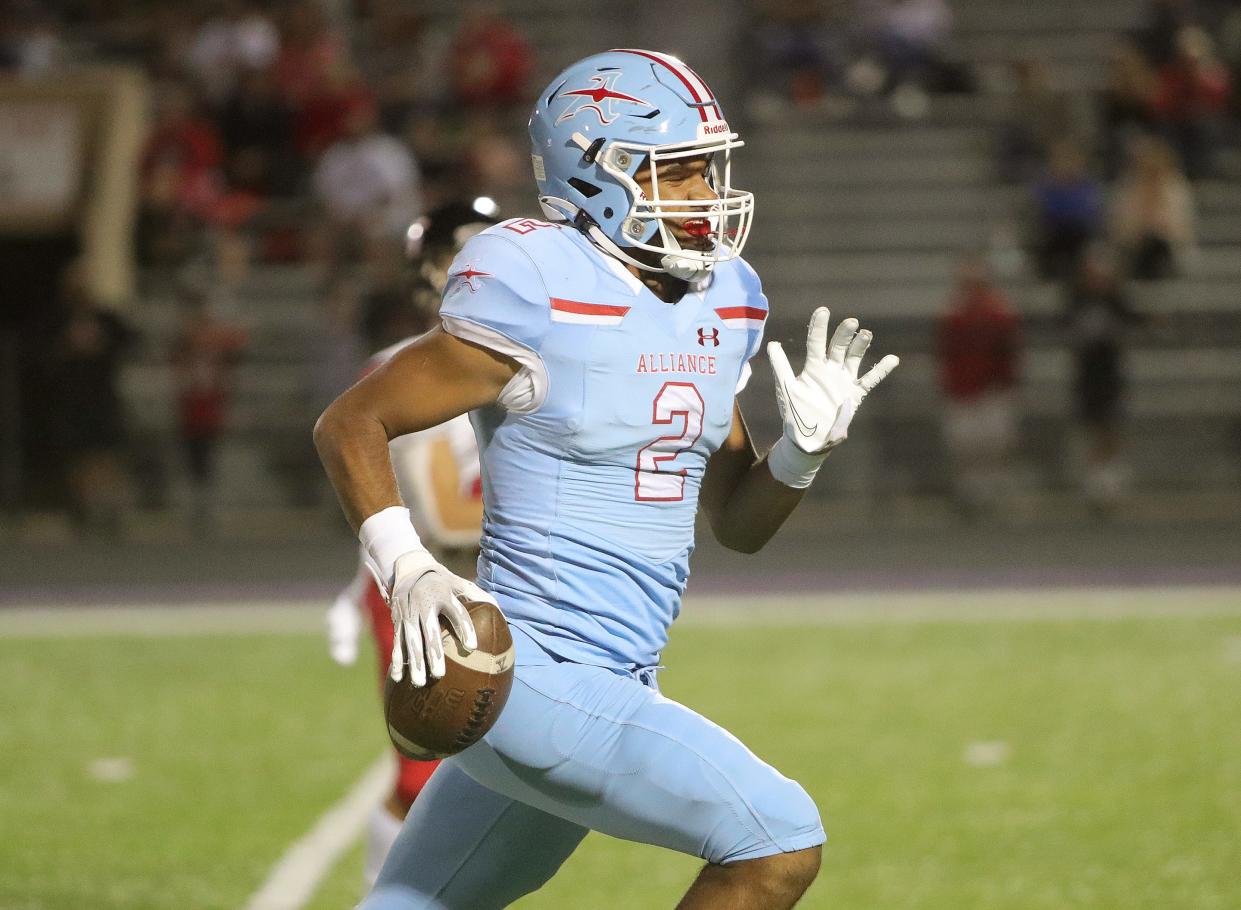 Alliance's K'Vaughn Davis runs for a second-quarter touchdown against Salem, Friday, Sept. 22, 2023.