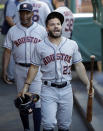 Houston Astros' Jose Altuve (27) shouts in the dugout before the team's baseball game against the Los Angeles Angels on Tuesday, July 16, 2019, in Anaheim, Calif. (AP Photo/Marcio Jose Sanchez)