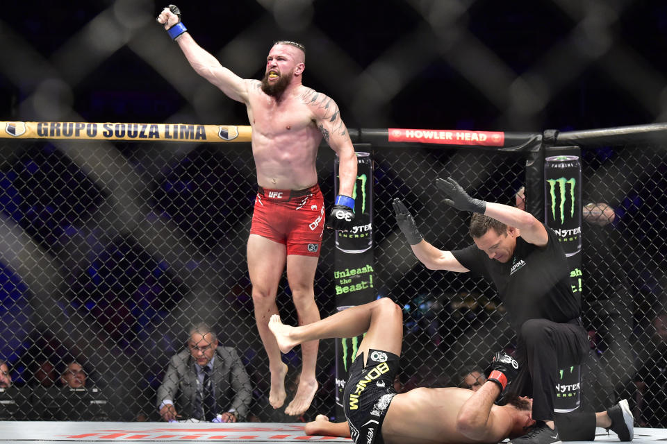 Nov 4, 2023; Sao Paulo, Brazil; Nicolas Dalby (blue gloves) reacts after defeating Gabriel Bonfim (red gloves) during the UFC Fight Night at Ibirapuera Arena. Mandatory Credit: Jason da Silva-USA TODAY Sports