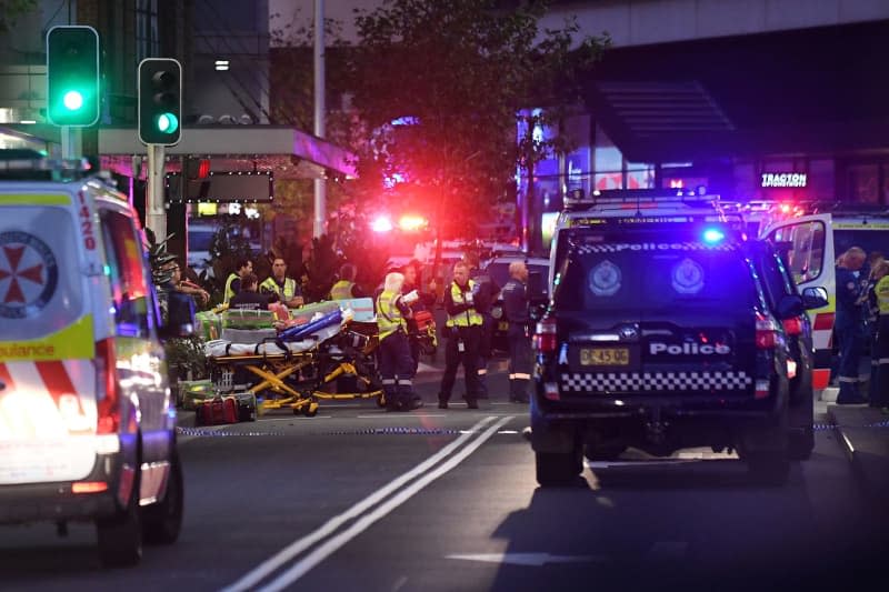 Emergency services are seen at Bondi Junction after multiple people were stabbed inside the Westfield Bondi Junction shopping centre in Sydney. A shopping centre is in lockdown in Sydney's eastern suburbs after multiple people were stabbed and a man was shot by police. Steven Saphore/AAP/dpa