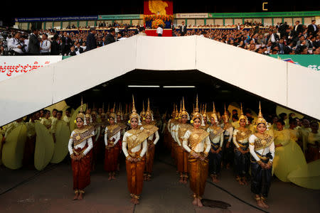 Cambodian traditional dancers attend an event to mark the 40th anniversary of the toppling of Pol Pot's Khmer Rouge regime at the Olympic stadium in Phnom Penh, Cambodia, January 7, 2019. REUTERS/Samrang Pring