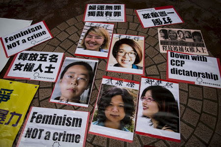 Portraits of Li Tingting (top L), Wei Tingting (top R), (bottom, L-R) Wang Man, Wu Rongrong and Zheng Churan are pictured during a protest calling for their release in Hong Kong, in this April 11, 2015 file photo. Feminists in China are embracing Taiwan's presidential front-runner Tsai Ing-wen as a role model - in a country where the last woman leader was the empress dowager more than a century ago. REUTERS/Tyrone Siu/Files