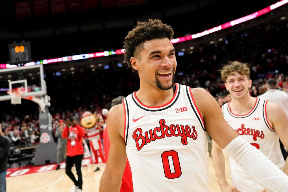 Tanner Holden celebrates a last-second shot that beat Rutgers.