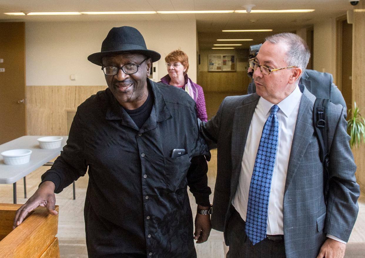 FRED ZWICKY/JOURNAL STAR FILE PHOTO In this Journal Star file photo from May, 25, 2017, Cleve Heidelberg enters the Peoria County Courthouse for the first time in 47 years from the street entrance free on bond as heads into a hearing. Walking with Cleve is defense attorney Andy Hale.