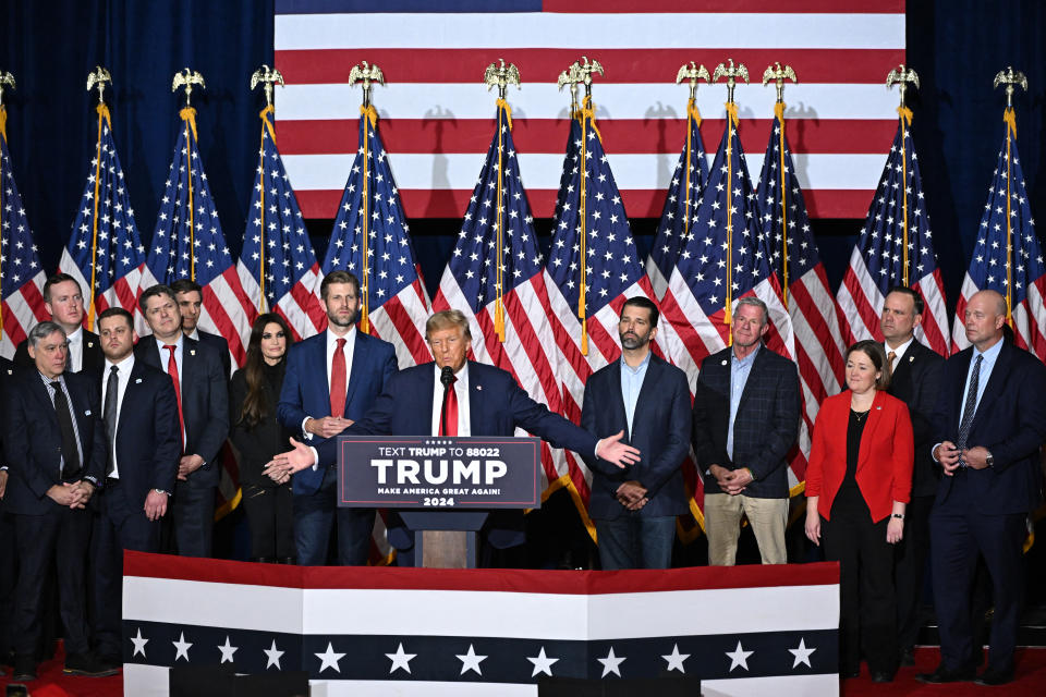 TOP SHOT - Former U.S. President and Republican presidential candidate Donald Trump speaks at the 2024 Iowa Republican Presidential Caucus Watch Party on January 15, 2024 in Des Moines, Iowa. Trump told the American people on Monday. 
