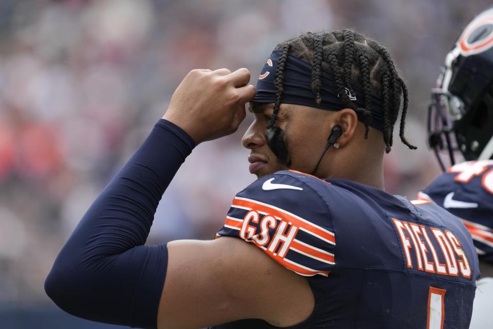 Chicago Bears quarterback Justin Fields watches during the first half of an NFL preseason football game against the Buffalo Bills, Saturday, Aug. 26, 2023, in Chicago. (AP Photo/Nam Y. Huh)