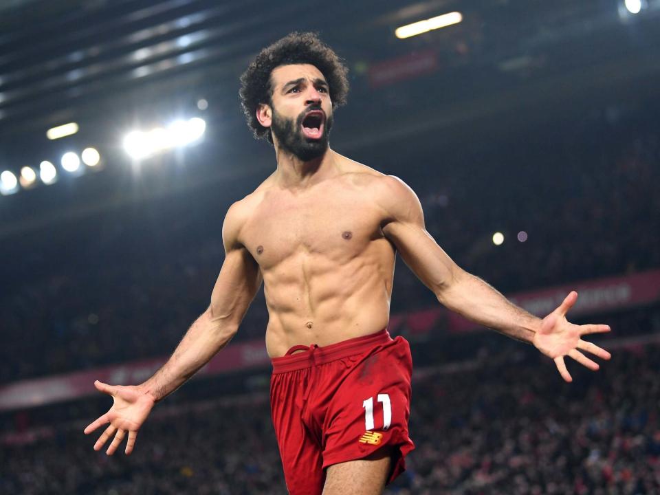 Mohamed Salah of Liverpool celebrates after scoring: Getty