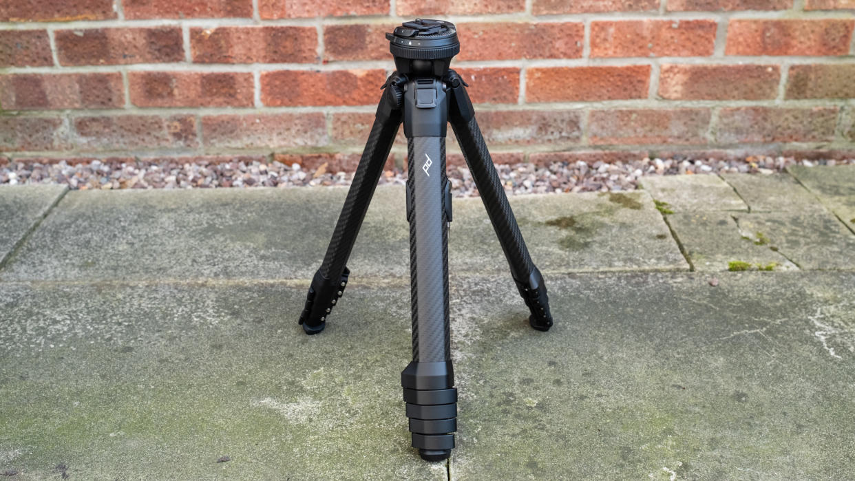  Peak Design Travel Tripod folded on the ground. 