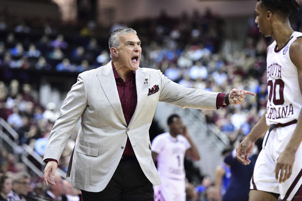 South Carolina coach Frank Martin yells to A.J. Lawson (00) during the first half of the team's NCAA college basketball game against Kentucky on Wednesday, Jan. 15, 2020, in Columbia, S.C. (AP Photo/Sean Rayford)