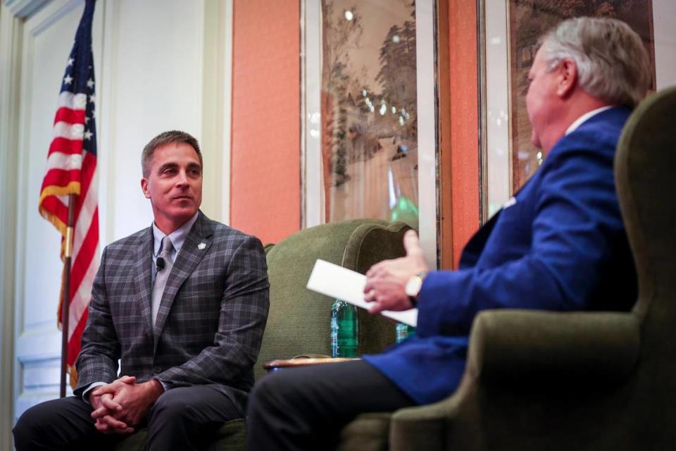 Guest speaker Chris Cassidy, a 10-year retired Navy Seal and Director of the new Medal of Honor Museum in Arlington listens to questions from John Goff during the Exchange Club Luncheon honoring the Goodfellows Fund Wednesday, Nov. 8, 2021, at Fort Worth Club.