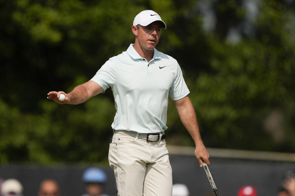 Rory McIlroy, of Northern Ireland, waves after making a putt on the 10th hole during the final round of the U.S. Open golf tournament Sunday, June 16, 2024, in Pinehurst, N.C. (AP Photo/Matt York)