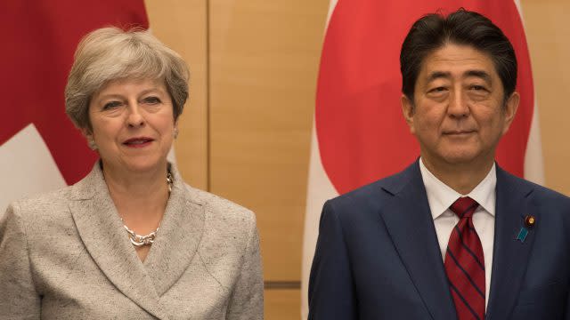 Prime Minister Theresa May and her Japanese counterpart Shinzo Abe meet with Japan's National Security Council at the Prime Minister's office in Tokyo where they discussed the situation with North Korea (Stefan Rousseau/PA)