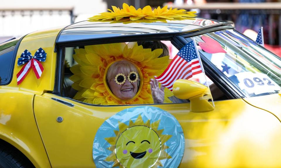 Members of the Corvette car club pass on J Street during the Independence Day Parade in Modesto, Calif., Tuesday, July 4, 2023. Andy Alfaro/aalfaro@modbee.com