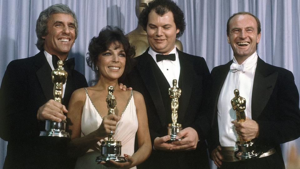 FILE - Burt Bacharach, from left, appears with Carole Bayer Sager, Christopher Cross and Peter Allen, winners of the Oscar for best original song 