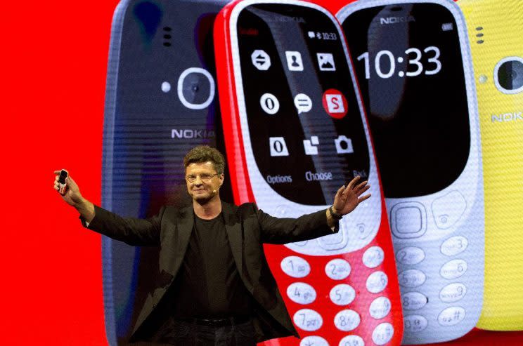 Arto Nummela, Chief Executive Officer at HMD Global, shows the new re-launched Nokia 3310 phone, ahead of Monday’s opening of the Mobile World Congress wireless show in Barcelona, Spain, Sunday, Feb. 26, 2017. Finland-based HMD Global is re-launching the simple Nokia 3310 model along with unveiling three new devices at Mobile World Congress in Barcelona. (AP Photo/Emilio Morenatti)