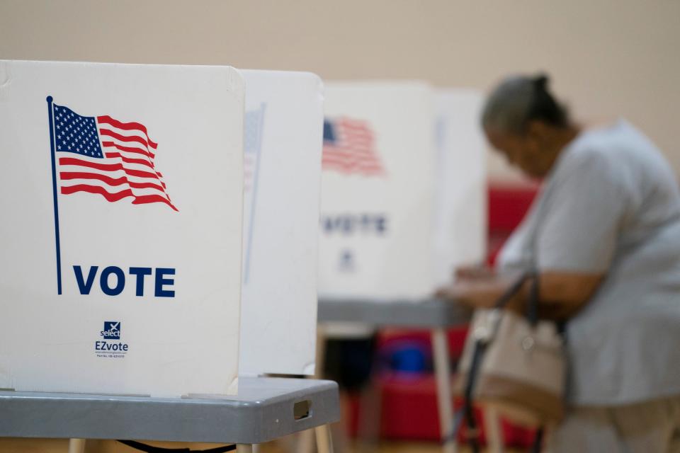 Voters go to the polls during the Michigan primary on Aug. 2, 2022.