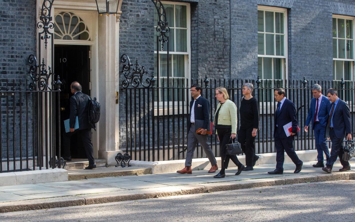 University leaders arrive at No 10 Downing Street this morning