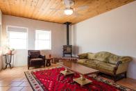 <p>Addmitedly, the interior isn’t anything to write home about. That said, it’s clean and spacious with ample room to relax.<br>(Airbnb) </p>