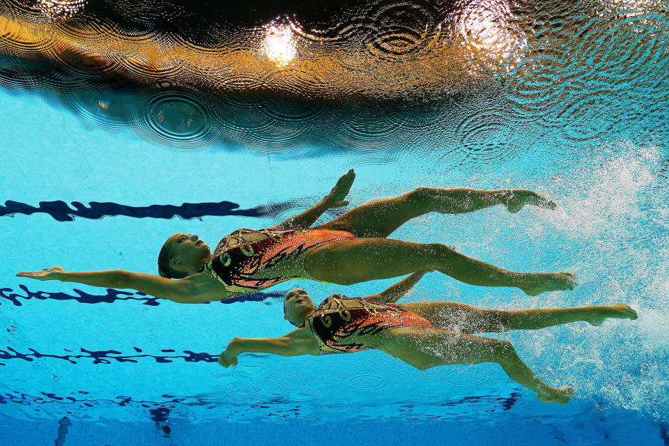 Olivia Federici and Jenna Randall of Great Britain compete in the Women's Duets Synchronised Swimming Technical Routine on Day 9 of the London 2012 Olympic Games at the Aquatics Centre on August 5, 2012 in London, England. (Photo by Clive Rose/Getty Images)