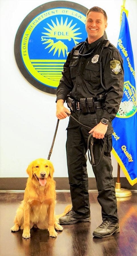 Laya and her handler, Travis Tharp, a Capitol Police officer.