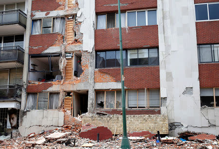 A damaged building is seen after an earthquake in Mexico City, Mexico September 19, 2017. REUTERS/Ginnette Riquelme