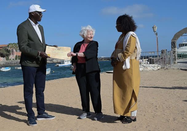 PHOTO: In this Jan. 21, 2023, file photo, Treasury Secretary Janet Yellen receives an award diploma of Great Pilgrim from lawyer and Goree's mayor Augustin Senghor (L) during a visit on Goree Island off the coast of the city of Dakar. (Seyllou/AFP via Getty Images, FILE)