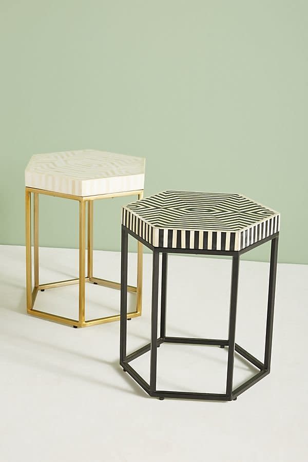 Get it from <a href="https://www.anthropologie.com/shop/hexagonal-inlay-side-table?category=furniture-end-tables&amp;color=014" target="_blank">Anthropologie</a>.&nbsp;