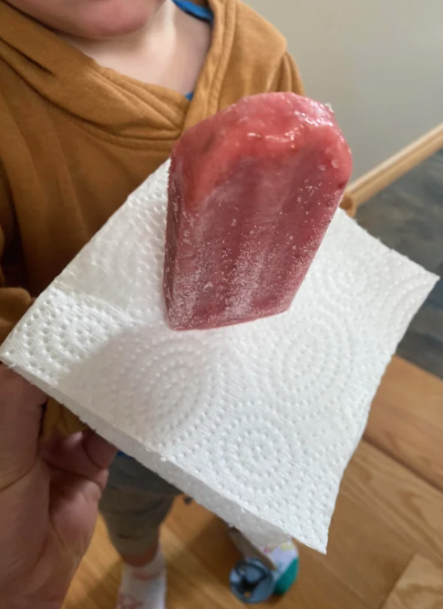 a napkin under a popsicle