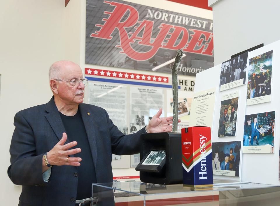 Frank Goldstein explains how this B-25 aircraft rib from a bomber that was part of the Doolittle Raiders daring World War II mission over Japan, was obtained for the Doolittle Raiders exhibit in the lobby of Raider Arena at Northwest Florida State College.