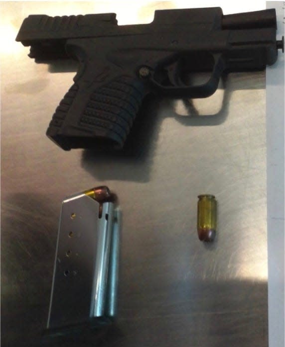 Security personnel at Indianapolis International Airport in 2020 stopped a man from carrying a loaded .45 caliber handgun and magazine onto an airplane. (Photo: Provided by TSA)