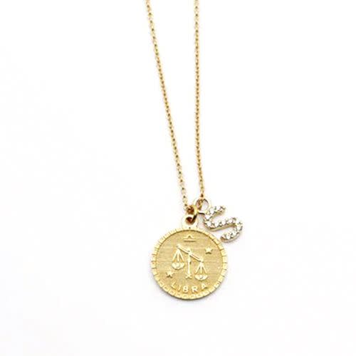 <p><a href="https://themjewelersny.com/products/the-zodiac-medal-initial-necklace?_pos=4&_sid=25f992ed6&_ss=r&variant=31403156668478" rel="nofollow noopener" target="_blank" data-ylk="slk:Shop Now;elm:context_link;itc:0;sec:content-canvas" class="link ">Shop Now</a></p><p>The Zodiac Medal Initial Necklace</p><p>themjewelersny.com</p><p>$135.00</p>