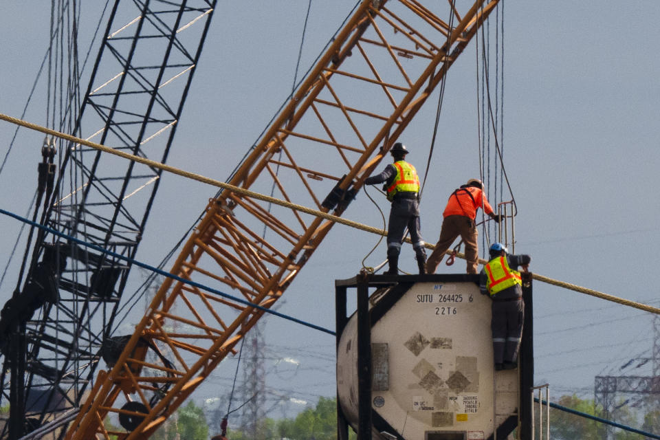 Salvage work continues on the collapsed Francis Scott Key Bridge, Thursday, April 25, 2024, in Baltimore. (AP Photo/Matt Rourke)