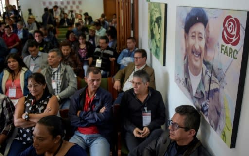 Former FARC rebels participate in a meeting of their new political party in Bogota on August 31, 2018