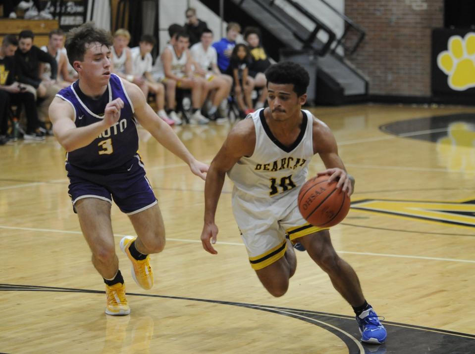 Paint Valley's Jeremy Cain (#10, right) drives toward the basket during the Bearcats' preseason scrimmage against the Unioto Shermans at Paint Valley High School on Nov. 24, 2023, in Bainbridge, Ohio.