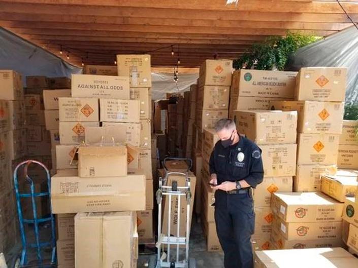 Authorities found over 500 boxes of commercial grade fireworks in large cardboard boxes.