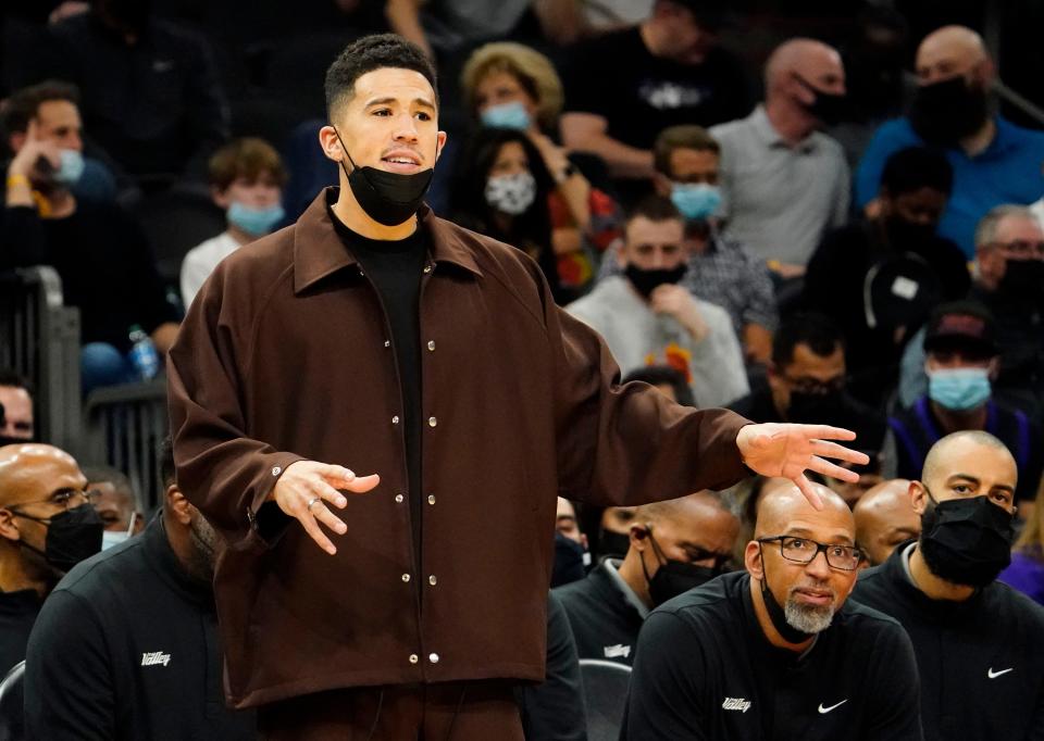 Dec 2, 2021; Phoenix, Arizona, USA; Phoenix Suns guard Devin Booker during action against the Detroit Pistons at Footprint Center. Mandatory Credit: Rob Schumacher-Arizona Republic