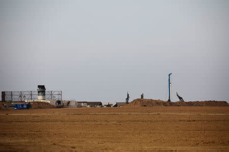 A drill (R) is seen as it works on what the Israeli forces said was a "significant" cross-border attack tunnel from the Gaza Strip, which was being dug by the enclave's dominant Islamist group, Hamas, near IsraelÕs border with the Gaza Strip December 10, 2017. REUTERS/Amir Cohen