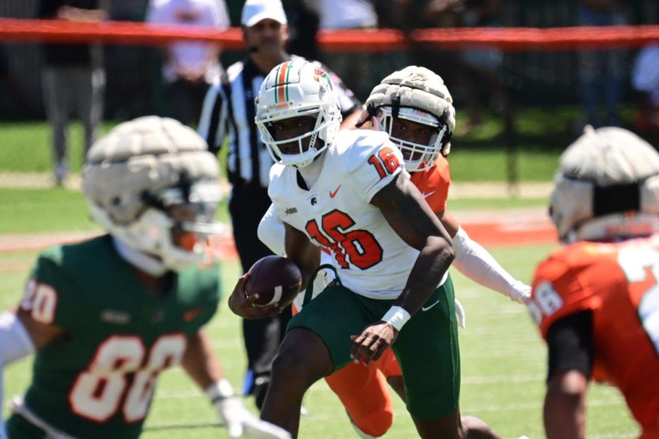 Florida A&M football quarterback DJ Boney (16) rushes during the Orange and Green Spring Game at Bragg Memorial Stadium in Tallahassee, Florida, Saturday, April 15, 2023