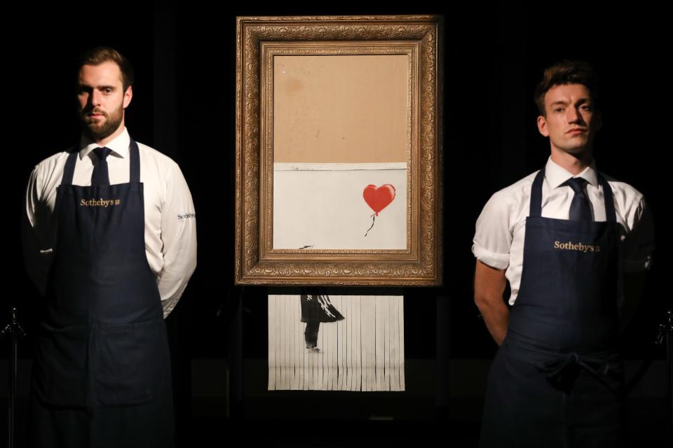 <h1 class="title">Banksy’s ‘Self-Destructed’ Painting Is Reborn As a New Work 2</h1><cite class="credit">Tristan Fewings/Getty Images</cite>