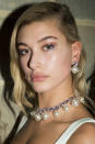 <p>Hailey Baldwin rocks a strong glitter eye at Topshop.<em> [Photo: Topshop]</em> </p>