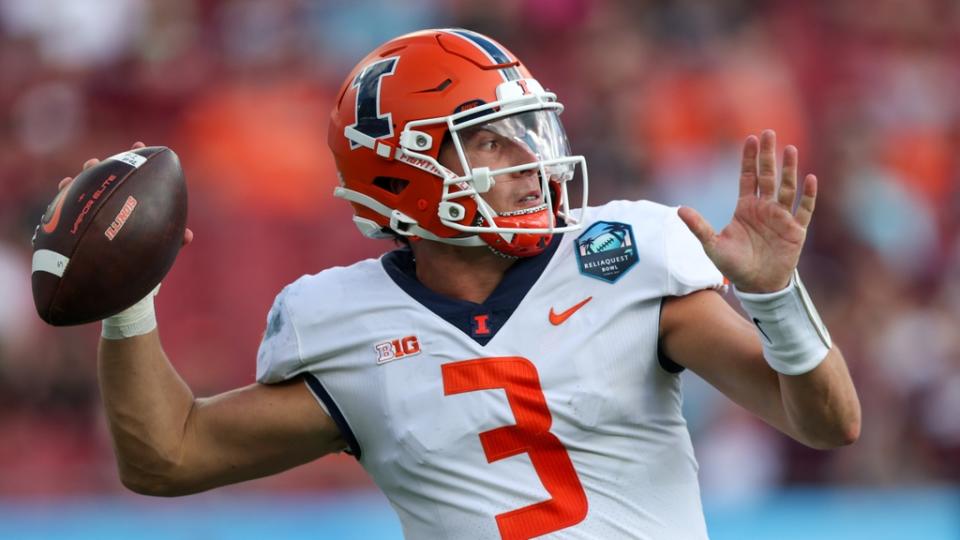 Jan 2, 2023; Tampa, FL, USA; Illinois Fighting Illini quarterback Tommy DeVito (3) throws a pass against the Mississippi State Bulldogs in the third quarter during the 2023 ReliaQuest Bowl at Raymond James Stadium.