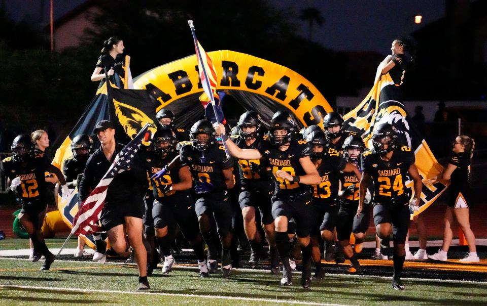 Sep 16, 2022; Scottsdale, Arizona, USA; Saguaro Sabercats take the field to play the Sandra Day O'Connor Eagles during a game played at Saguaro High.