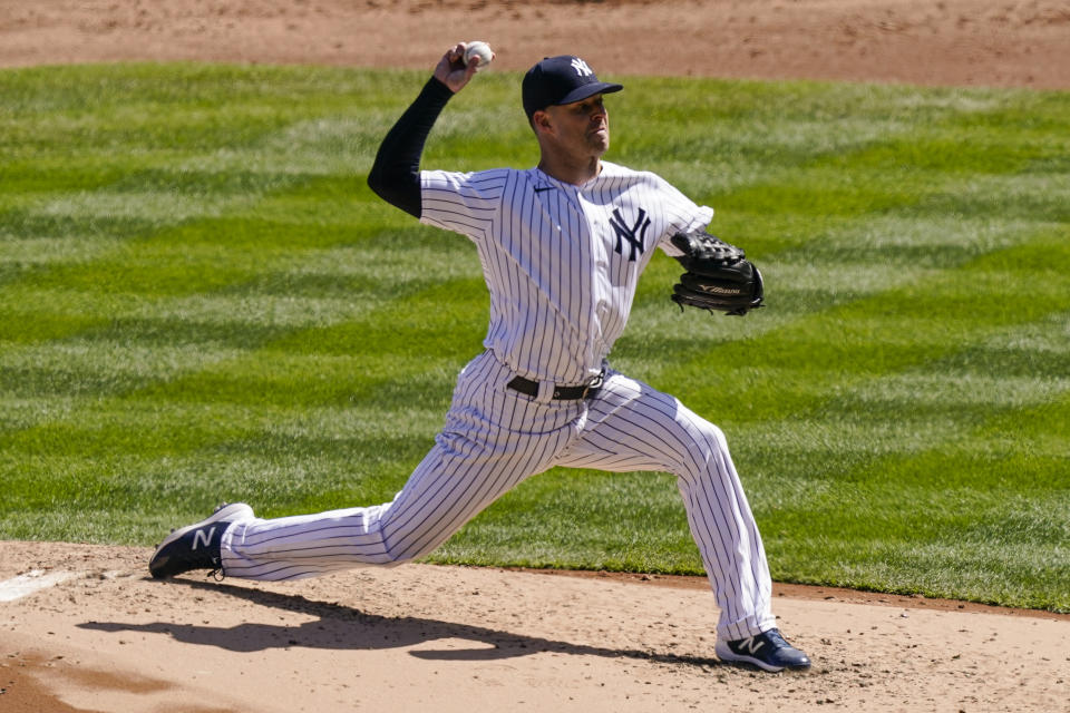 New York Yankees starting pitcher Corey Kluber throws during the third inning of a baseball game against the Toronto Blue Jays, Saturday, April 3, 2021, in New York. (AP Photo/John Minchillo)