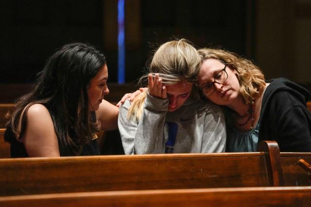 Parishioners participate in a community vigil at Belmont United Methodist Church in the aftermath of the school shooting in Nashville, Tennessee.