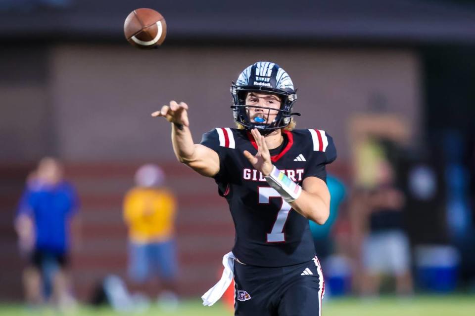 Gilbert Indians quarterback Drake Braddock (7) passes against the Lexington Wildcats during their game at Gilbert High School Friday, Sept. 15, 2023.