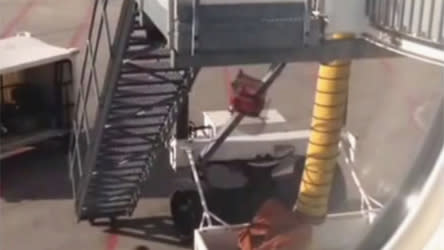 Air Canada frequent flyer records video of carry-on baggage being tossed down to a cargo bin