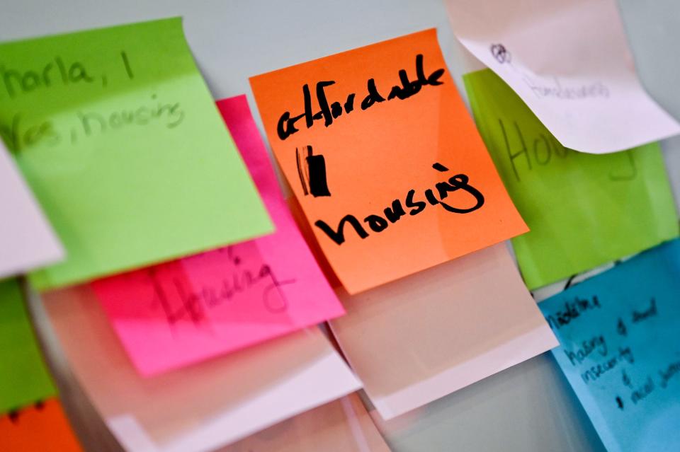 Notes of issues of importance cover a white board during the People's Council meeting on Wednesday, July 20, 2022, at The Fledge in Lansing.