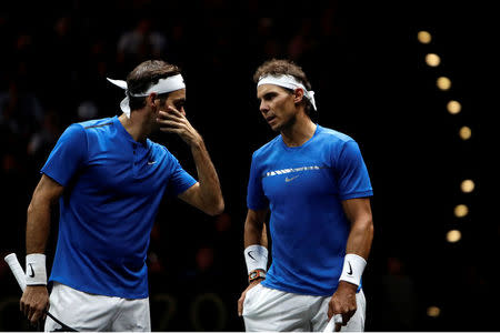 Tennis - Laver Cup - 2nd Day - Prague, Czech Republic - September 23, 2017 - Rafael Nadal and Roger Federer of team Europe in action against Jack Sock and Sam Querrey of team World. REUTERS/David W Cerny