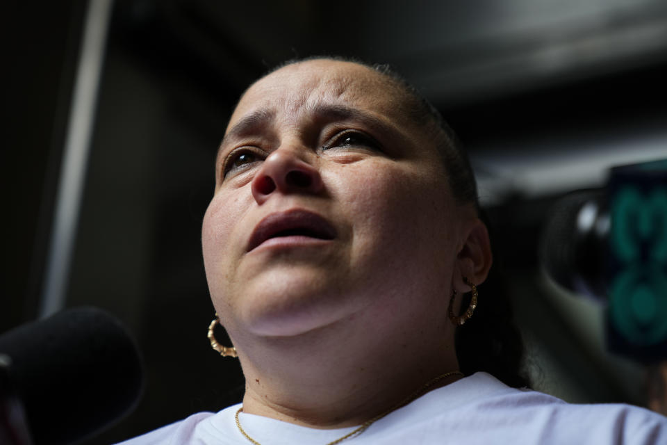 Eddie Irizarry's aunt Ana Cintron speaks with members of the media after a judge has reinstated all charges, including a murder count, against former police officer Mark Dial, in Philadelphia, Wednesday, Oct. 25, 2023. Dial on Aug. 14, shot and killed Irizarry during a during a traffic stop. (AP Photo/Matt Rourke)