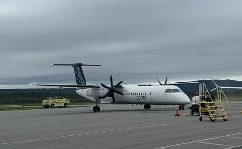 Porter Airlines landed at Deer Lake Regional Airport for their first flight as part of new daily offerings to Halifax on Tuesday. (Alex Kennedy/CBC - image credit)